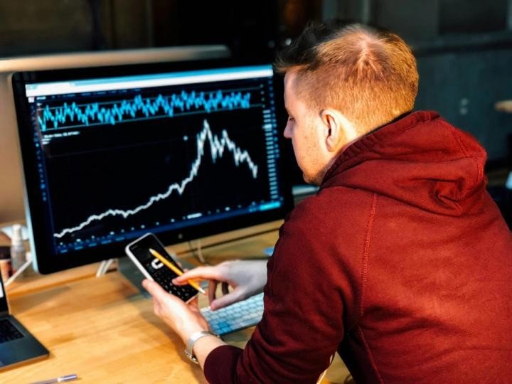 Bitcoin holds near $65,000 as $800 billion AI selloff leaves crypto largely untouched
